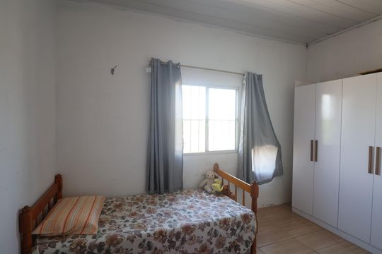 Quarto 2 de casa à venda com 3 quartos, 120m² em Mato Grande, Canoas