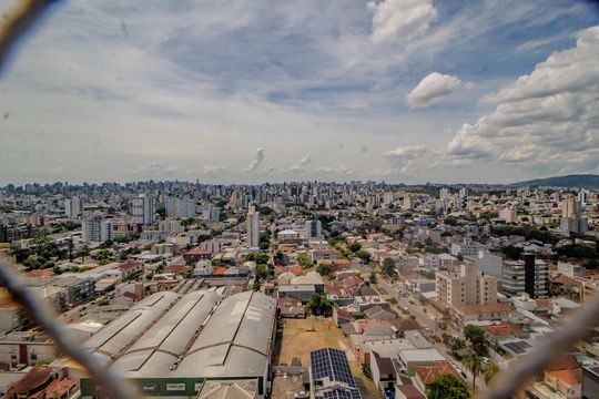 Vista sala de apartamento à venda com 2 quartos, 67m² em Santo Antônio, Porto Alegre