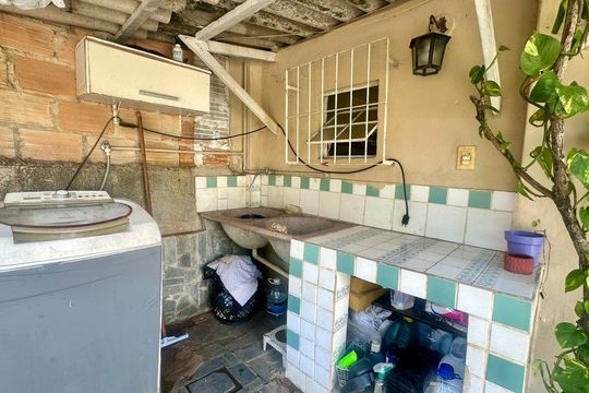 Área de serviço  de casa à venda com 3 quartos, 100m² em Bandeirantes (pampulha), Belo Horizonte