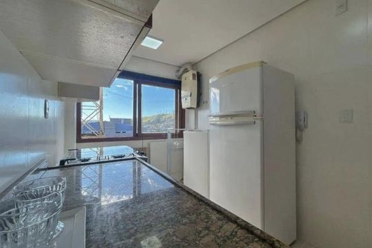 Cozinha de apartamento à venda com 1 quarto, 45m² em Santo Antônio, Porto Alegre