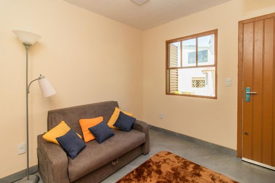 Sala de casa de condomínio à venda com 2 quartos, 65m² em Cavalhada, Porto Alegre