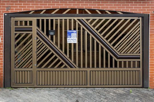 Fachada de casa à venda com 3 quartos, 130m² em Centro, Diadema