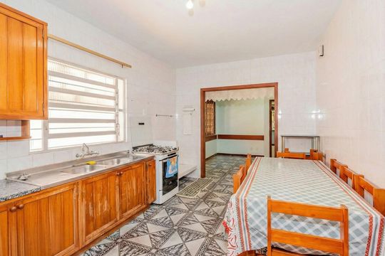 Cozinha de casa à venda com 2 quartos, 146m² em Guarujá, Porto Alegre