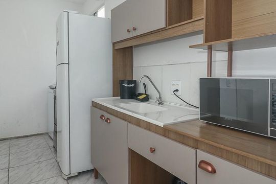 Cozinha de apartamento à venda com 2 quartos, 46m² em Rubem Berta, Porto Alegre