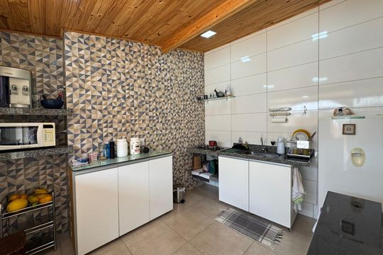 Cozinha de casa à venda com 4 quartos, 210m² em Boa Vista, Belo Horizonte