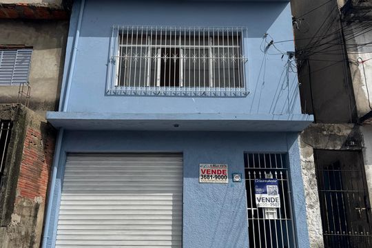 Fachada com placa de casa à venda com 3 quartos, 225m² em Padroeira, Osasco