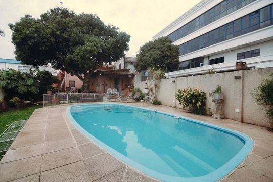 Área Externa  de casa para alugar com 4 quartos, 580m² em Menino Deus, Porto Alegre