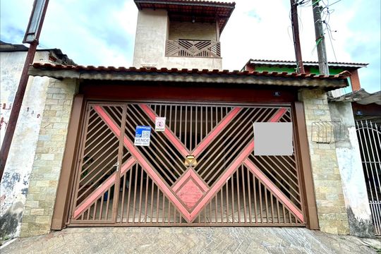 Placa instalada na fachada do imóvel  de casa à venda com 3 quartos, 160m² em Gopouva, Guarulhos