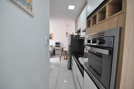 Cozinha de apartamento à venda com 2 quartos, 49m² em Vila Nivi, São Paulo