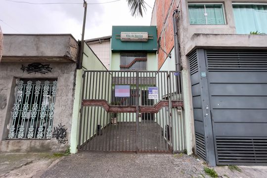 Fachada+Placa de casa à venda com 2 quartos, 112m² em Jardim Popular, São Paulo