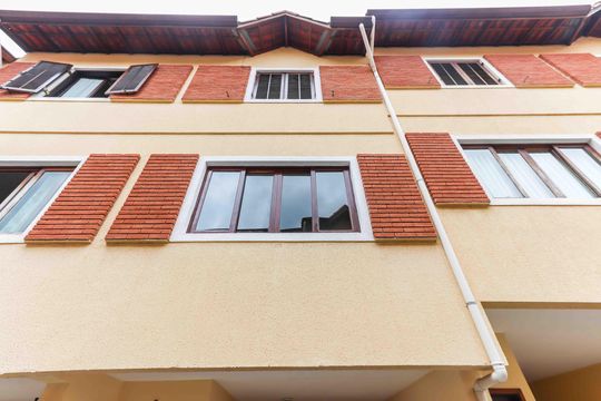 Fachada de casa de condomínio à venda com 2 quartos, 113m² em Vila Gomes, São Paulo