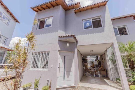 Fachada de casa de condomínio à venda com 3 quartos, 94m² em Sarandi, Porto Alegre