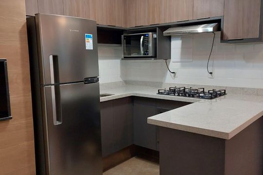 Cozinha de apartamento à venda com 1 quarto, 50m² em Auxiliadora, Porto Alegre