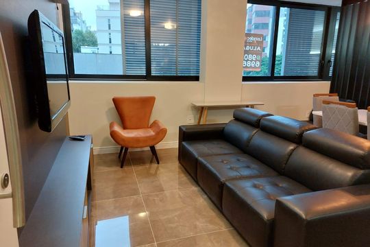 Sala de apartamento à venda com 1 quarto, 50m² em Auxiliadora, Porto Alegre