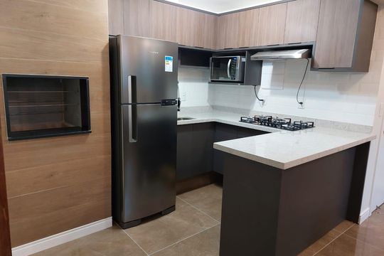 Cozinha de apartamento à venda com 1 quarto, 50m² em Auxiliadora, Porto Alegre