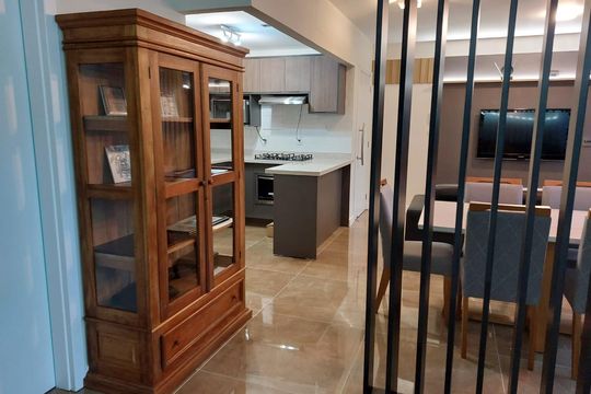 Sala de apartamento à venda com 1 quarto, 50m² em Auxiliadora, Porto Alegre