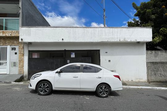 Fachada+Placa  de casa à venda com 4 quartos, 310m² em Jardim Santana, São Paulo