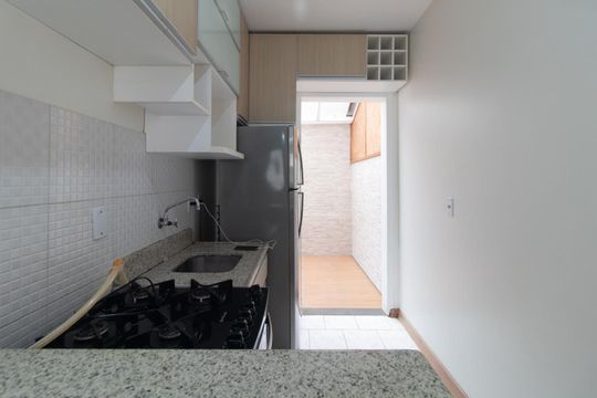 Cozinha de casa de condomínio para alugar com 3 quartos, 60m² em Vila Nova, Porto Alegre