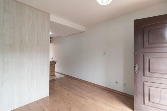 Sala de casa de condomínio para alugar com 3 quartos, 60m² em Vila Nova, Porto Alegre