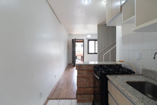 Cozinha de casa de condomínio para alugar com 3 quartos, 60m² em Vila Nova, Porto Alegre