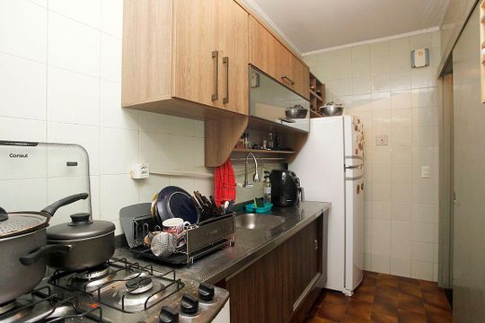 Cozinha + Área de Serviço de apartamento à venda com 1 quarto, 49m² em São João, Porto Alegre