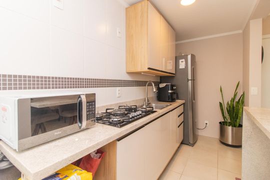 Cozinha de apartamento à venda com 1 quarto, 49m² em Santo Antônio, Porto Alegre