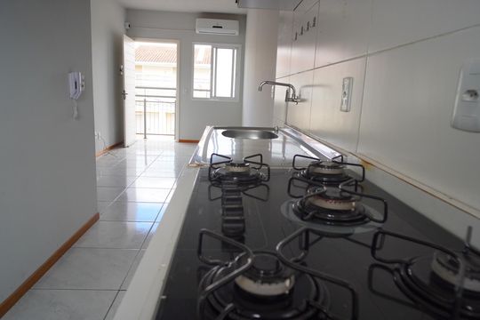 Cozinha  de casa de condomínio à venda com 2 quartos, 49m² em Restinga, Porto Alegre