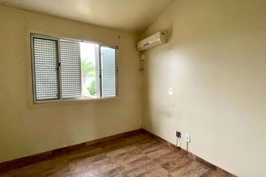 Quarto 1 de casa de condomínio à venda com 2 quartos, 80m² em Rio Branco, Canoas