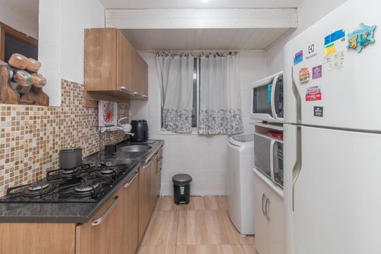 Cozinha de apartamento para alugar com 2 quartos, 70m² em Vila Nova, Porto Alegre