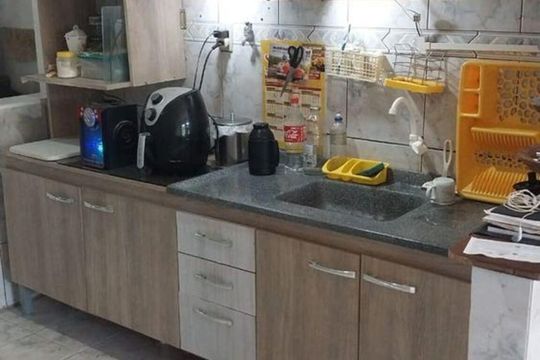 Cozinha  de casa de condomínio à venda com 2 quartos, 60m² em Costa E Silva, Porto Alegre