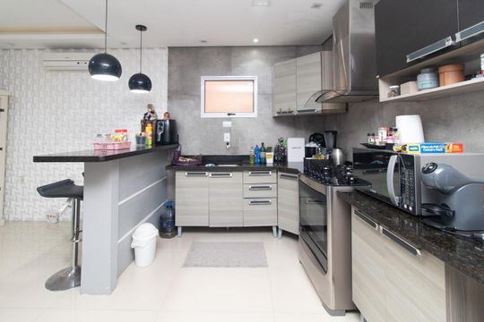 Cozinha de casa à venda com 2 quartos, 85m² em Glória, Porto Alegre