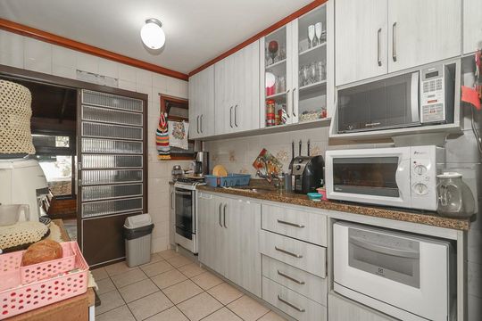 Cozinha de casa à venda com 3 quartos, 200m² em Jardim Sabará, Porto Alegre