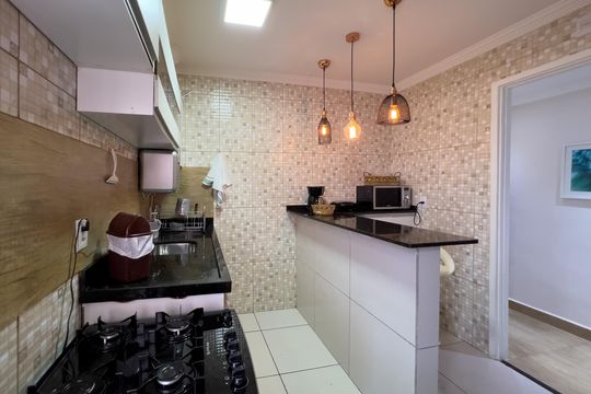 Cozinha e área de serviço de apartamento à venda com 2 quartos, 55m² em Vila Mariana, São Paulo