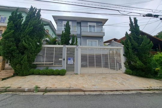 Fachada de casa à venda com 4 quartos, 400m² em City Bussocaba, Osasco