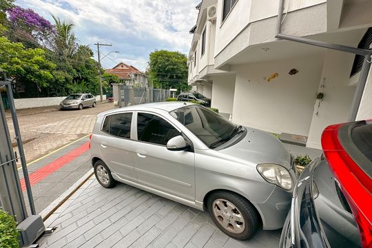 Garagem de casa de condomínio para alugar com 3 quartos, 112m² em Canasvieiras, Florianópolis