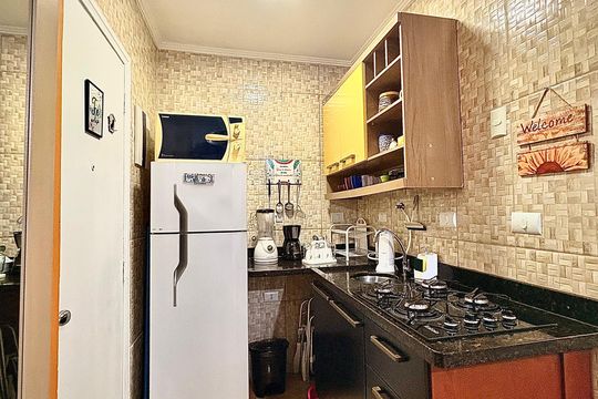 Cozinha de kitnet/studio para alugar com 1 quarto, 18m² em Gonzaguinha, São Vicente