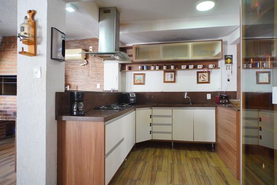 Cozinha de casa de condomínio à venda com 3 quartos, 253m² em Cavalhada, Porto Alegre