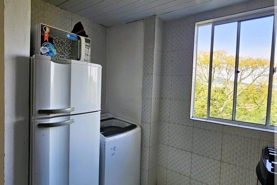 Cozinha de apartamento à venda com 2 quartos, 45m² em Vila Nova, Porto Alegre