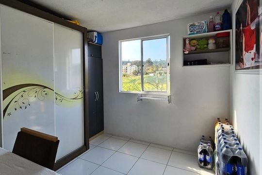 Quarto de apartamento à venda com 2 quartos, 45m² em Vila Nova, Porto Alegre