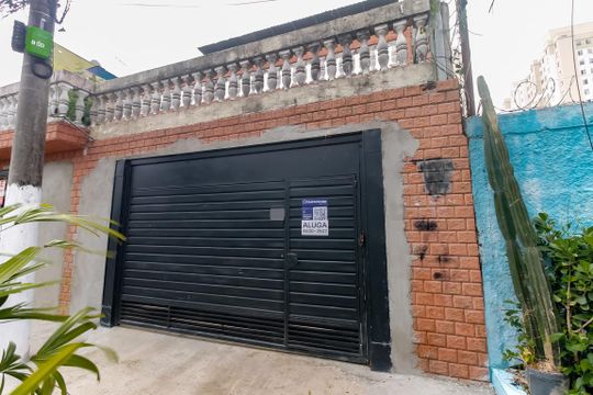Fachada e garagem de casa para alugar com 4 quartos, 250m² em Vila Ernesto, São Paulo