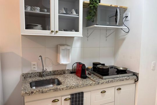 Cozinha de apartamento à venda com 1 quarto, 25m² em Jardim Paulista, São Paulo