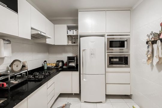 Cozinha  de casa de condomínio à venda com 2 quartos, 55m² em Vila Guilhermina, São Paulo