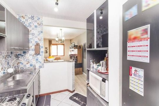 Cozinha de casa à venda com 2 quartos, 54m² em Hípica, Porto Alegre