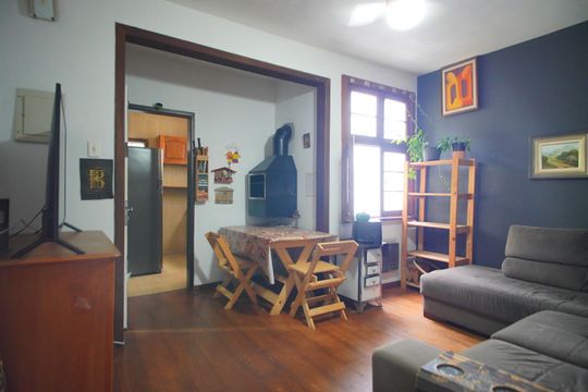 Sala de apartamento à venda com 1 quarto, 44m² em Auxiliadora, Porto Alegre