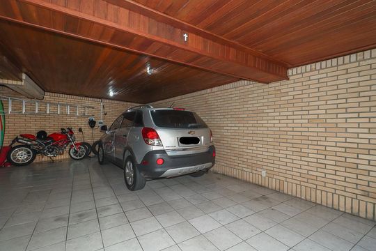 Garagem de casa de condomínio à venda com 5 quartos, 306m² em Boa Vista, Porto Alegre