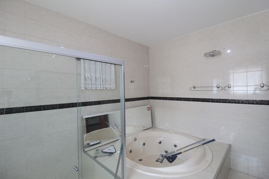 Banheiro da Suite Master de casa à venda com 4 quartos, 406m² em Itapoã, Belo Horizonte