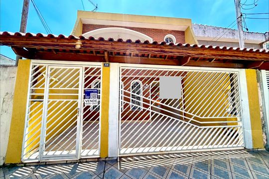 Placa instalada na fachada do imóvel de casa à venda com 3 quartos, 180m² em Jardim Nova Ipanema, Guarulhos