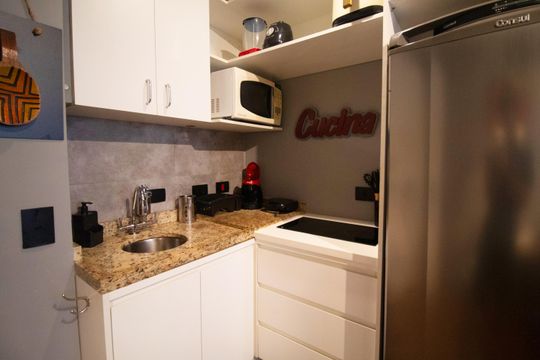 Cozinha de apartamento para alugar com 1 quarto, 27m² em Jardim Paulista, São Paulo