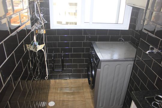 Cozinha com lavanderia de apartamento à venda com 2 quartos, 59m² em Picanço, Guarulhos