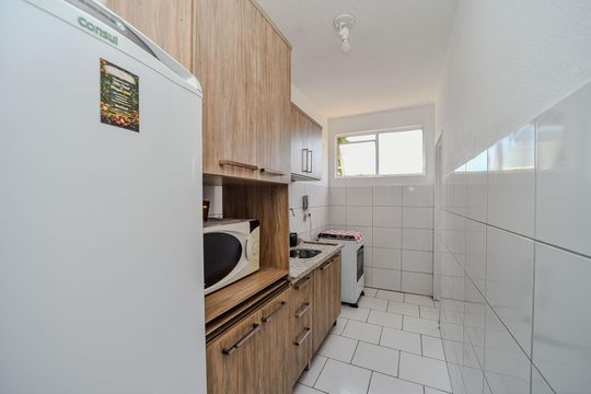 Cozinha de apartamento à venda com 1 quarto, 43m² em Jardim Sabará, Porto Alegre